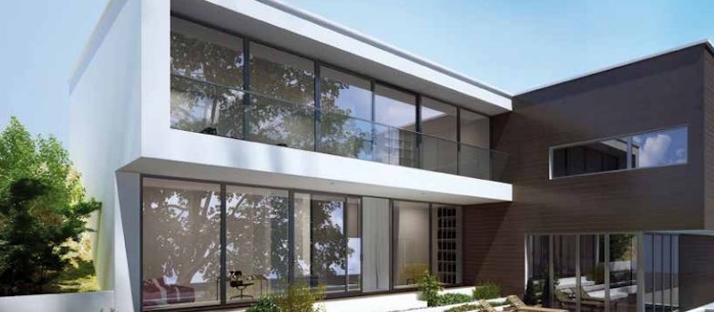 Grote moderne woning met veel kunststof kozijnen.